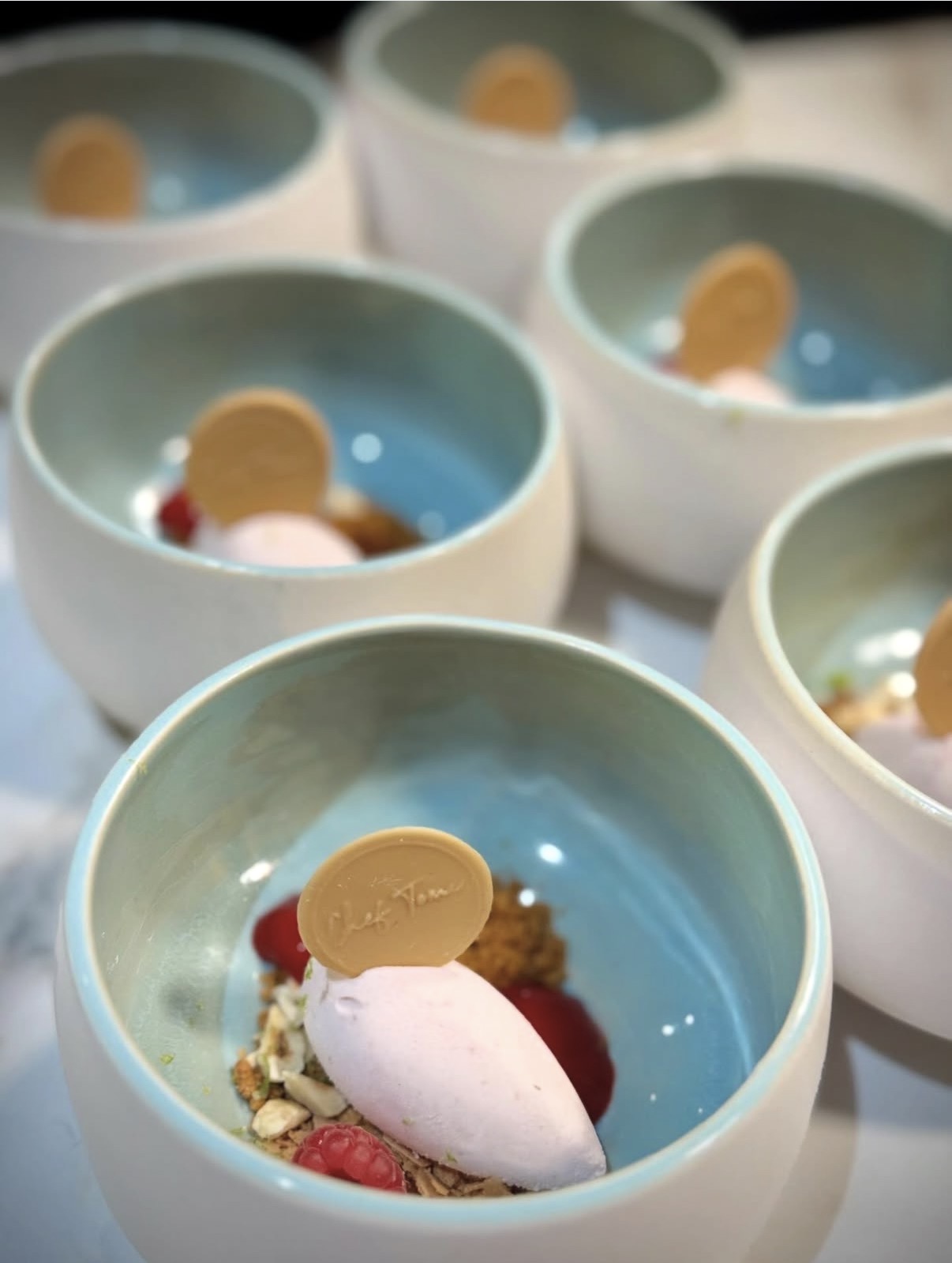 Rose mousse dessert with chef's medallion